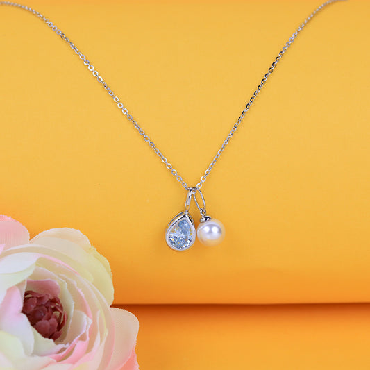 Silver hanging pear shape blue sapphire drop with pearl pendant with chain