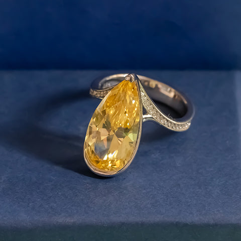 Silver yellow topaz pear shape ring