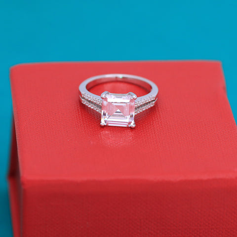 Silver Emerald Cut Side Diamonds Ring