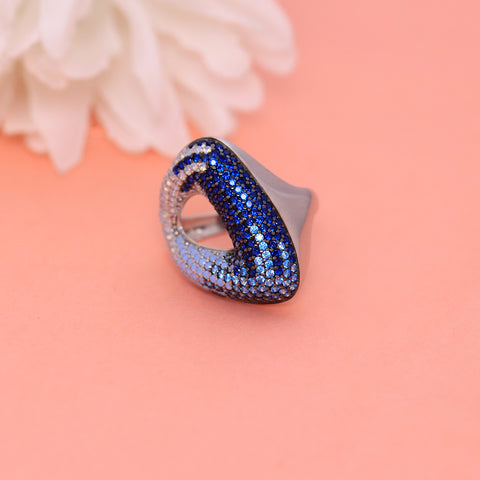 Silver blue stone studded tringle multi color ring