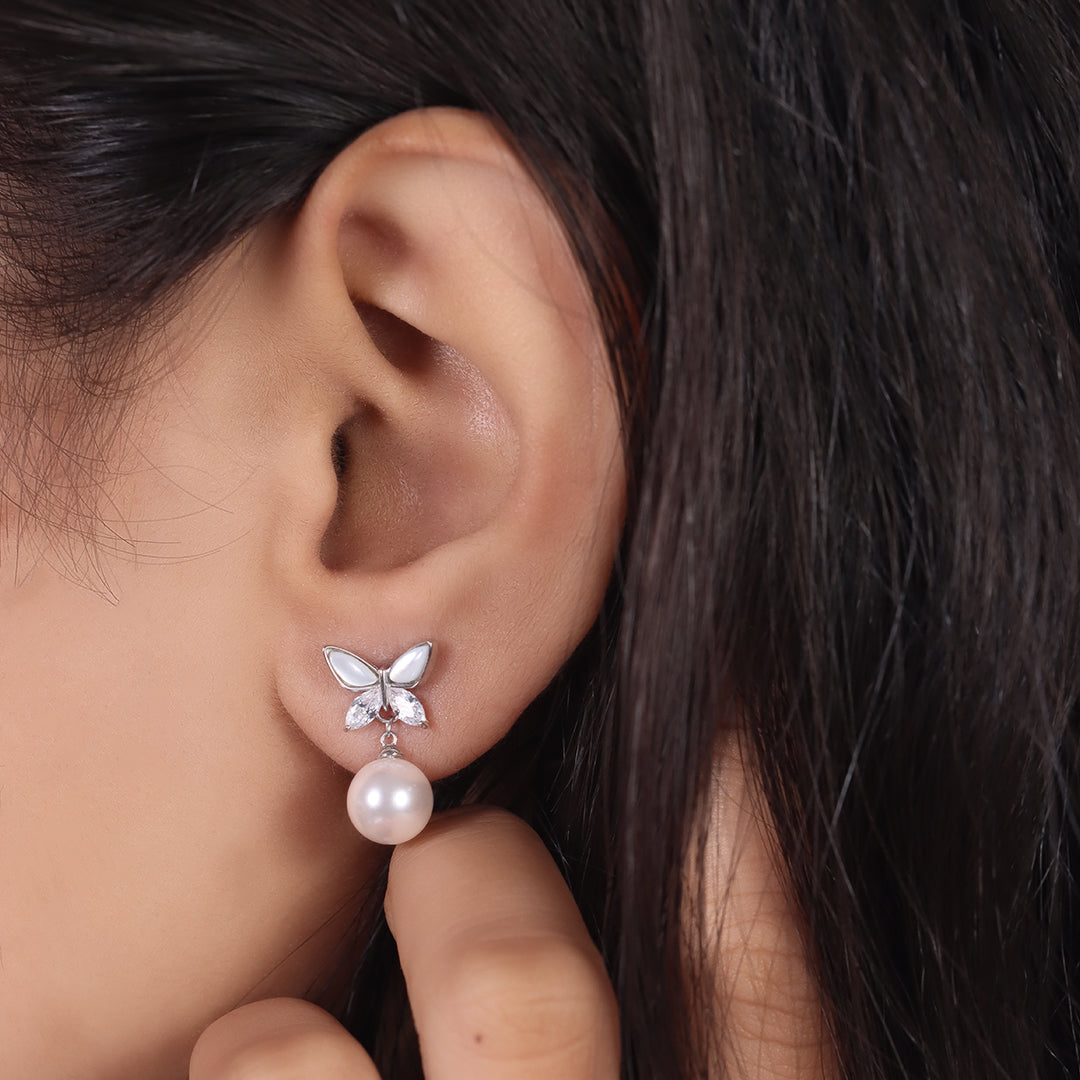 Silver butterfly pearl earrings