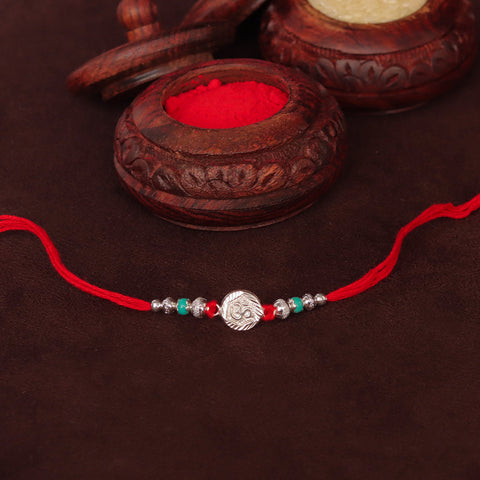Spiritual Om Rakhi with Silver Beads