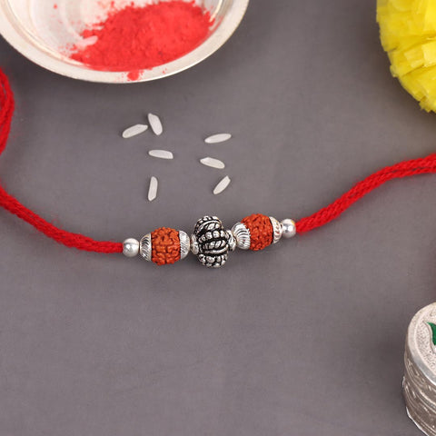 Silver Round Oxidized Bali Beads With Dual Rudraksha Rakhi