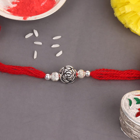 Silver Rose Design Bali Beads With Shiny Beads Rakhi