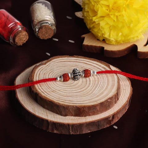 Silver Round Oxidized Bali Beads With Dual Rudraksha Rakhi