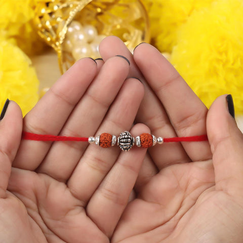 Silver Round Oxidized Bali Beads With Dual Rudraksha Rakhi