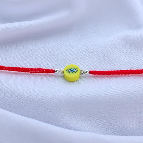 Yellow Round Shape Evil Eye With Silver Beads Rakhi for Kids