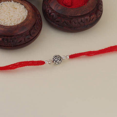 Silver Rose Design Bali Beads With Shiny Beads Rakhi