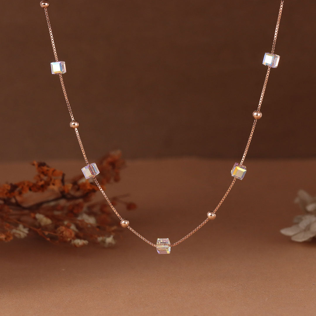 Rose gold beads and color change crystal cube necklace