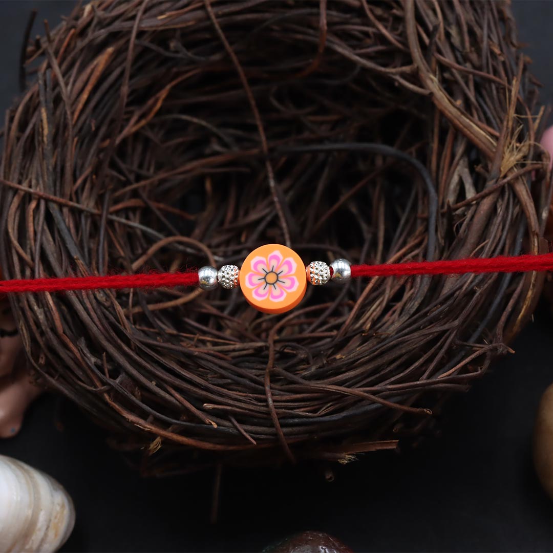 Orange Round Flower With Silver Beads Rakhi for Kids