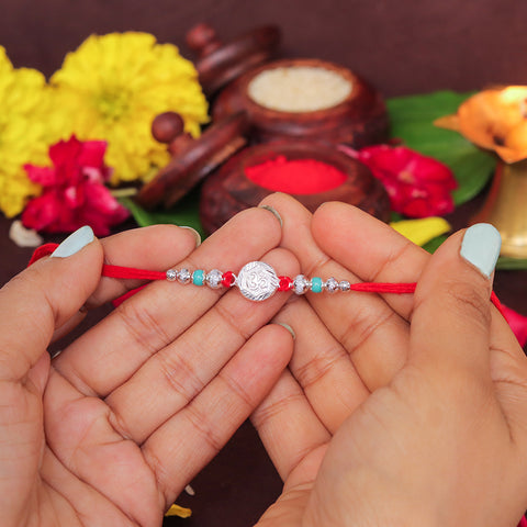 Spiritual Om Rakhi with Silver Beads