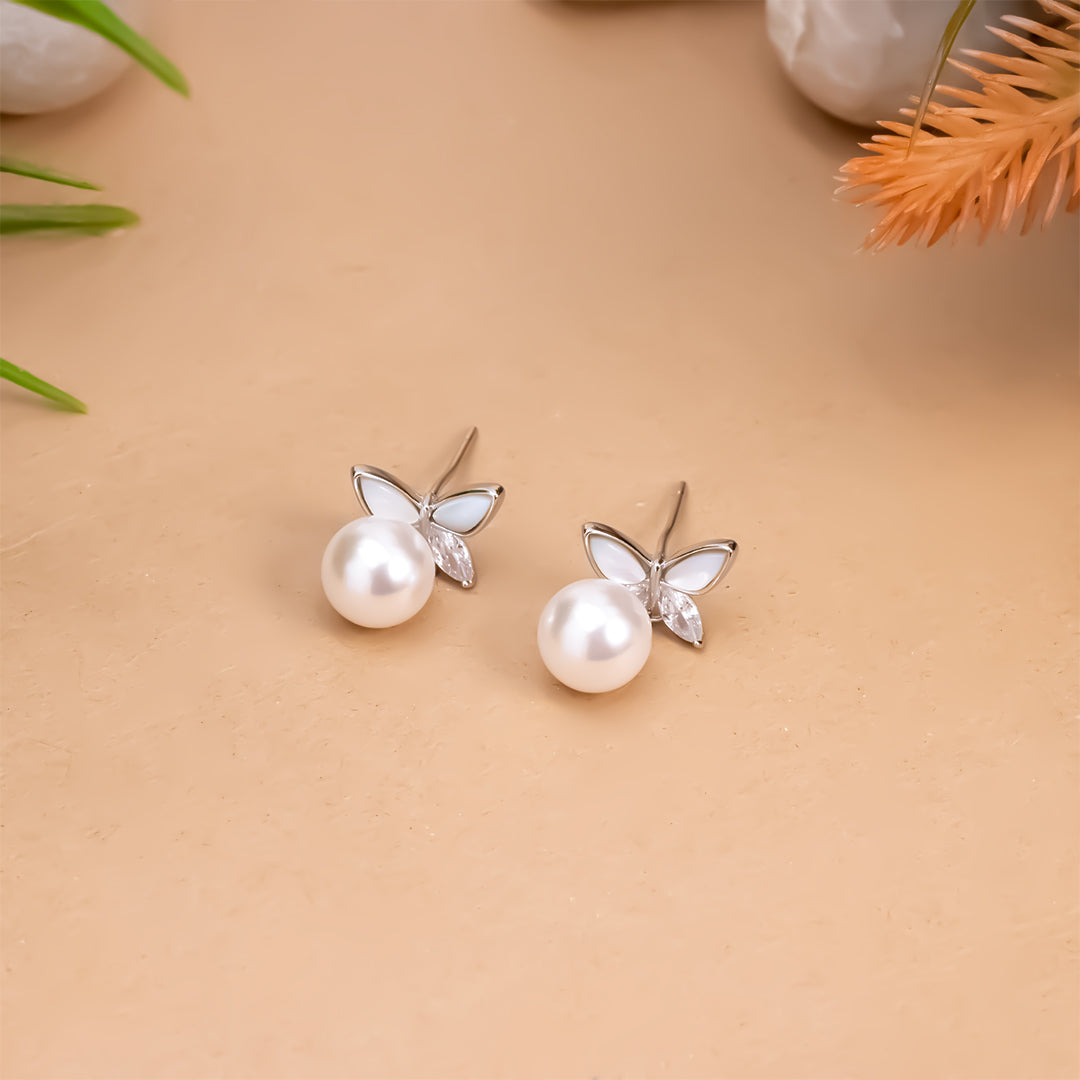 Silver butterfly pearl earrings