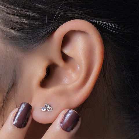 Silver diamond bicycle stud earring