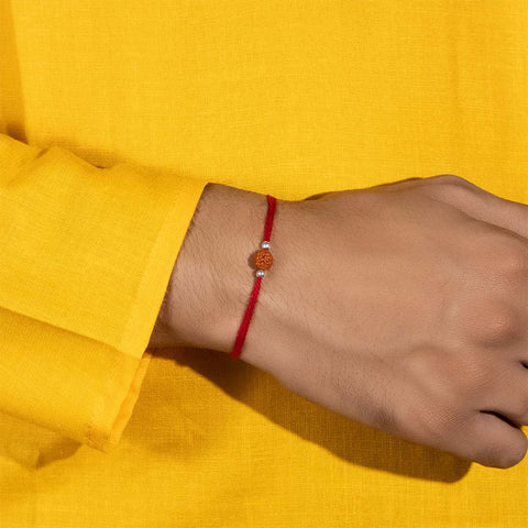 Rudraksha with plain silver bead rakhi