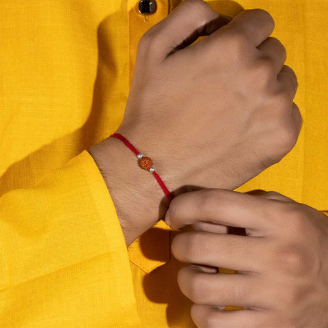 Rudraksha with plain silver bead rakhi