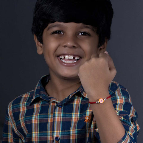 Orange Round Flower With Silver Beads Rakhi for Kids