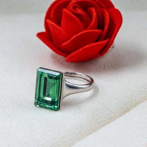 Silver green emerald cut sapphire ring