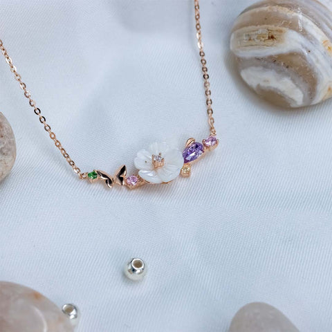 Rose gold lotus flower with mini butterfly pendant with chain