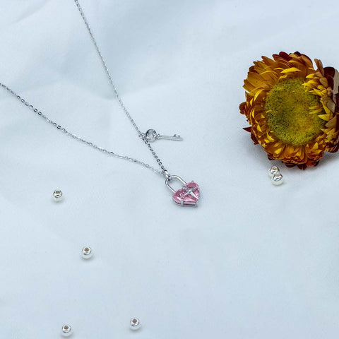 Silver pink sapphire heart shape lock with key pendant with chain