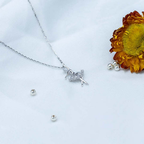 Silver white diamond dancing doll pendant with chain