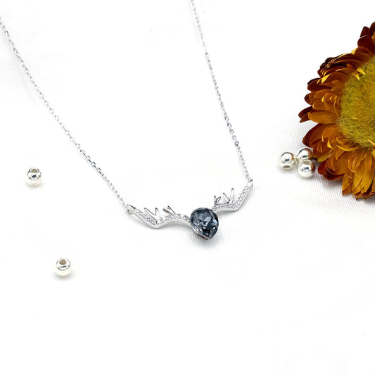 Silver pear shape black diamond studded deer pendant with chain
