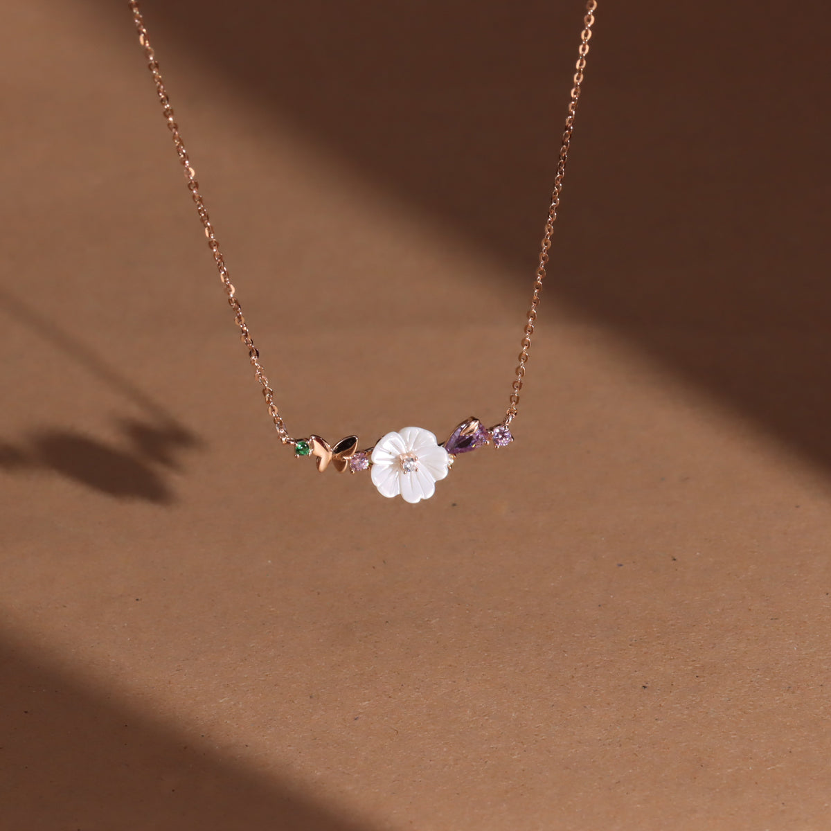 Rose gold lotus flower with mini butterfly pendant with chain