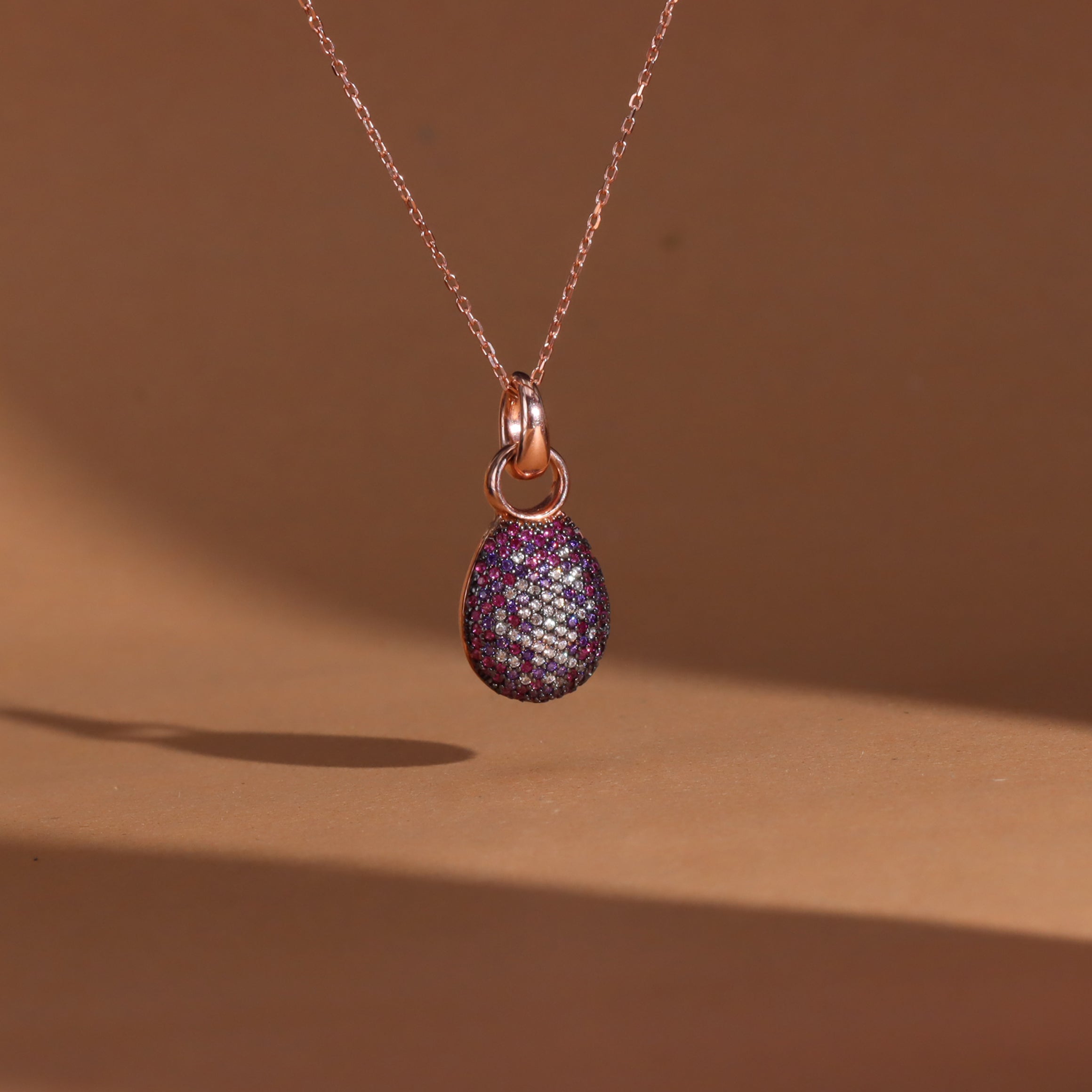 Oval shape rose gold pendant with chain