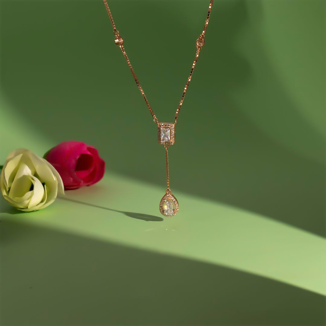 Rose gold square shape with hanging pear diamond necklace