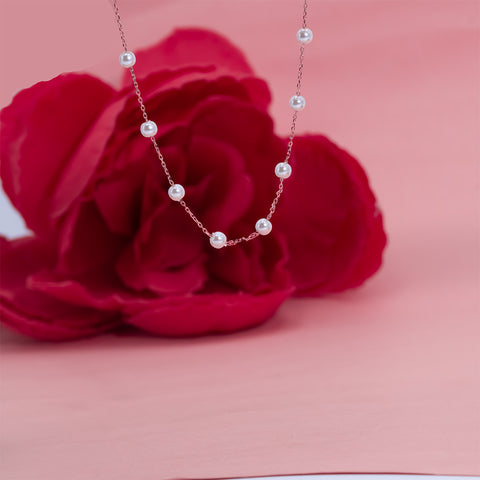 White beads with rose gold chain necklace