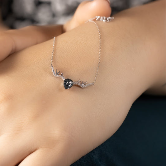 Silver pear shape black diamond studded deer pendant with chain