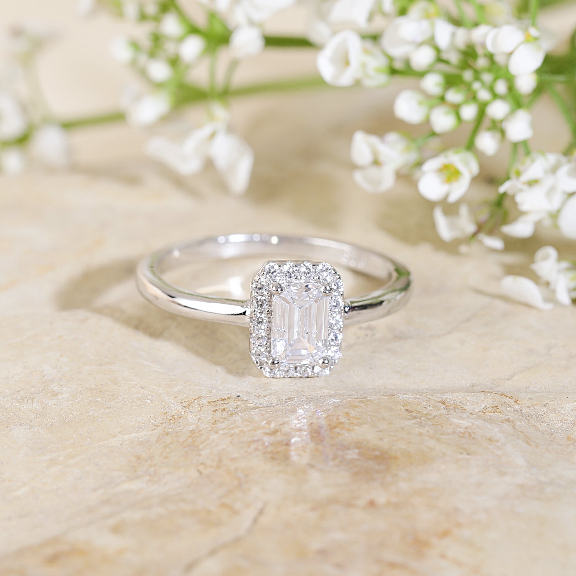 emerald cut silver diamond ring
