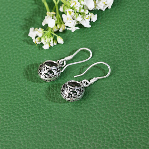 Round oxidized silver earring