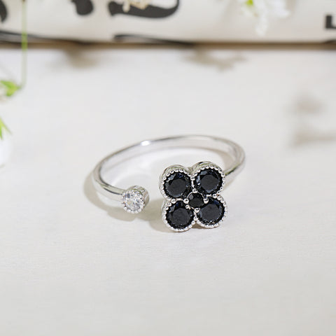 Black floral rotating silver diamond ring with adjustable size