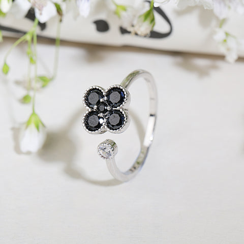 Black floral rotating silver diamond ring with adjustable size