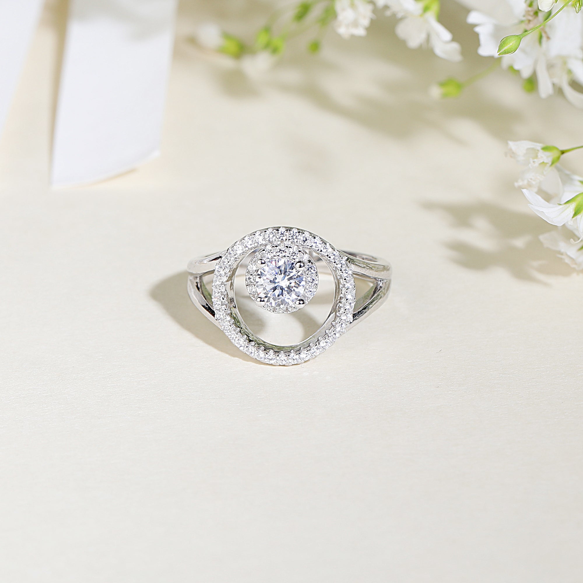 Round cut double halo engagement rings