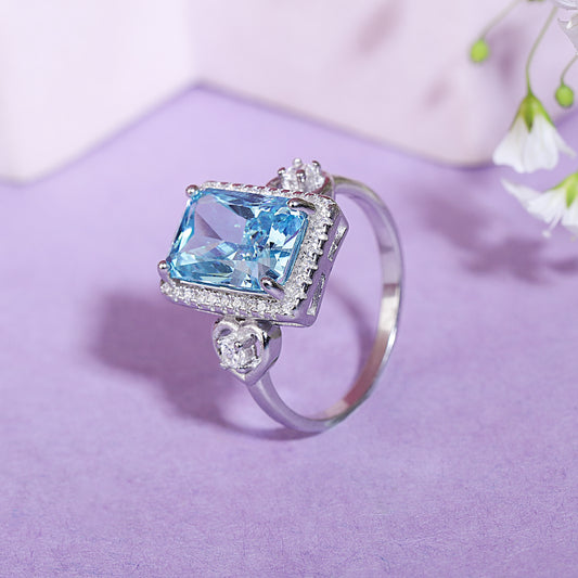 Cushion cut sapphire ring with diamonds