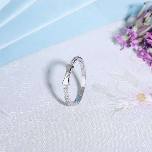 Silver mini bow tie adjustable diamond ring